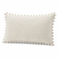 Cuscino decorativo 50 x 30 cm in tessuto beige con pompon stile boho